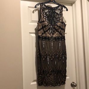 Sequence, lace, and beaded dress.